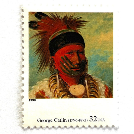 Close up image of George Catlin’s “The White Cloud, Head Chief of the Iowas" Postage Stamp from the 1998 Four Centuries of American Art Series. This stamp depicts the iconic painting of Native American Indian Chief White Cloud in his ceremonial warpaint and feathers. An iconic western indigenous theme, this postage stamp depicts the pride and heritage of Native Americans. These are vintage unused USPS postage stamps with a face value of 32 cents each. Scott number 3236K.