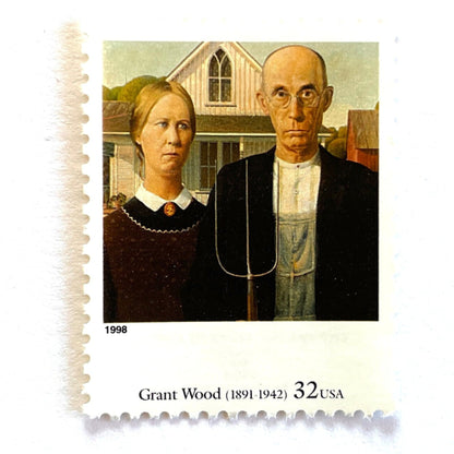 Grant Wood’s “American Gothic” Postage Stamp from the 1998 Four Centuries of American Art Series. This stamp depicts the iconic painting of man and woman, farmers or gardeners, standing in front of a farmhouse with a gothic style window. The man is holding a pitchfork. An iconic homesteading theme, this postage stamp depicts a couple and is often used for mailing wedding invitations and save the dates. These are vintage unused USPS postage stamps with a face value of 32 cents each. Scott number 3236Q.
