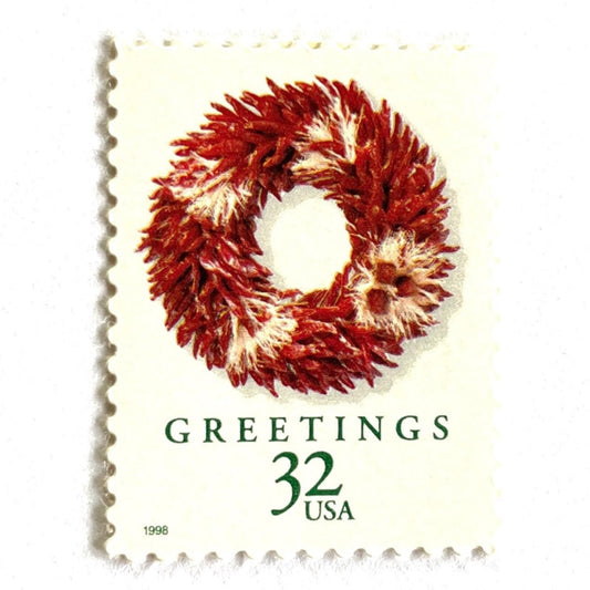 Image of 1998 Christmas Wreaths Series “Chili Pepper Wreath” 32-cent mail stamps. Scott #3251. Stamp Themes: Christmas Decor, Holiday Decor, Holidays, Winter Wedding, Chili Peppers, Decor, Mexican Winter Wedding, Southwestern Winter Wedding. Red postage stamp.