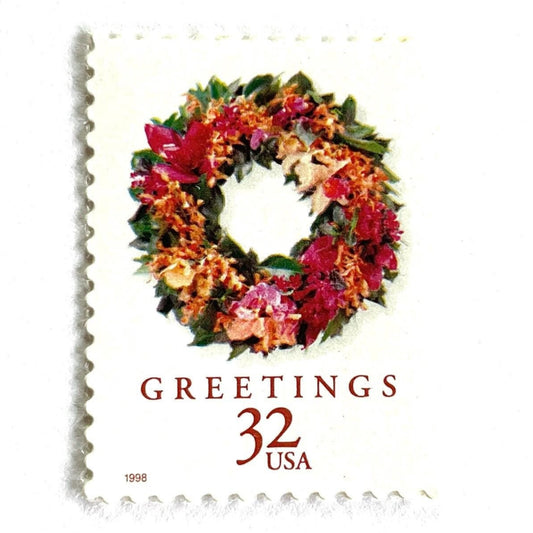 Image of 1998 Christmas Wreaths Series “Tropical Wreath” 32-cent mail stamps. Scott #3252. Stamp Themes: Christmas Decor, Holiday Decor, Holidays, Winter Beach Wedding, Hawaii, Decor, Tropics. Multicolored postage stamp.