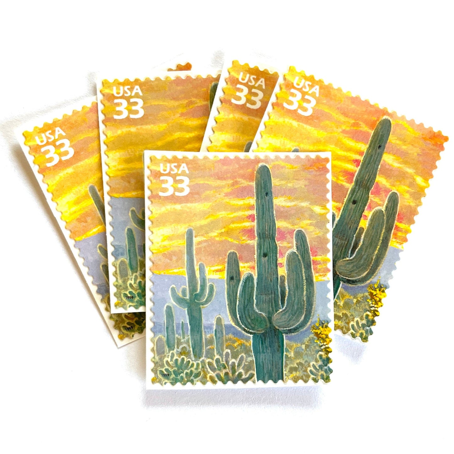 Image of Saguaro Cactus postage stamps from the 1999 Nature of America Sonoran Desert series, featuring a green saguaro cactus in a Southwestern desert landscape on vintage unused 33-cent USPS postage, Scott 3293e.