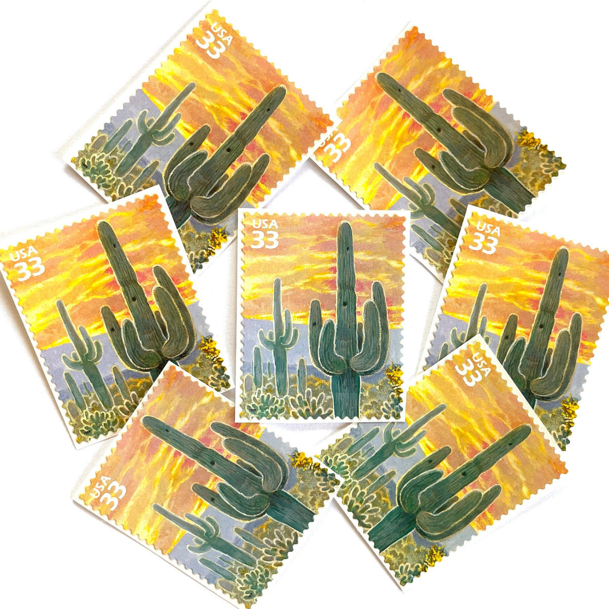Image of Saguaro Cactus postage stamps from the 1999 Nature of America Sonoran Desert series, featuring a green saguaro cactus in a Southwestern desert landscape on vintage unused 33-cent USPS postage, Scott 3293e.