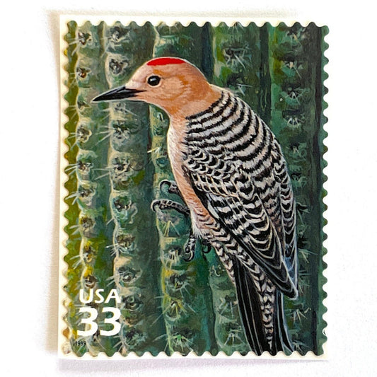Image of Gila Woodpecker postage stamps from the 1999 Nature of America Sonoran Desert issue, featuring a brown desert bird perched on a cactus in a Southwestern landscape on vintage unused 33-cent USPS postage, Scott 3293j.