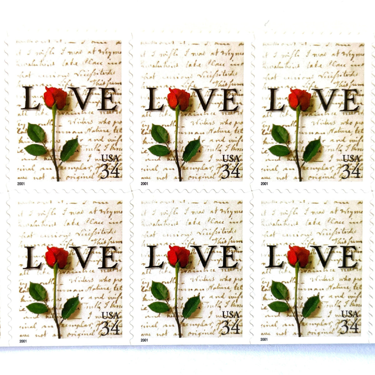 Rose & Love Letter postage stamps from 2001 featuring a red rose over John Adams’s handwritten love letter to Abigail Smith on vintage unused 34-cent USPS postage, Scott 3497.