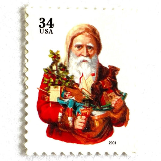 Image of 34-cent Contemporary Christmas Santa Claus Se-tenant “Santa with Toy Horse” USPS postage stamp featuring a relatively skinny white bearded Santa wearing a brown, hooded robe over a red suit. This sober looking Santa is holding a bounty of toys and gifts for children, including a doll dressed in blue and white, a small evergreen tree decorated with garland, and a rocking horse. Scott #3537. Stamp themes: Christmas, holidays, winter, Santa Claus, toys, gifts, winter wedding, winter save-the-date. Red