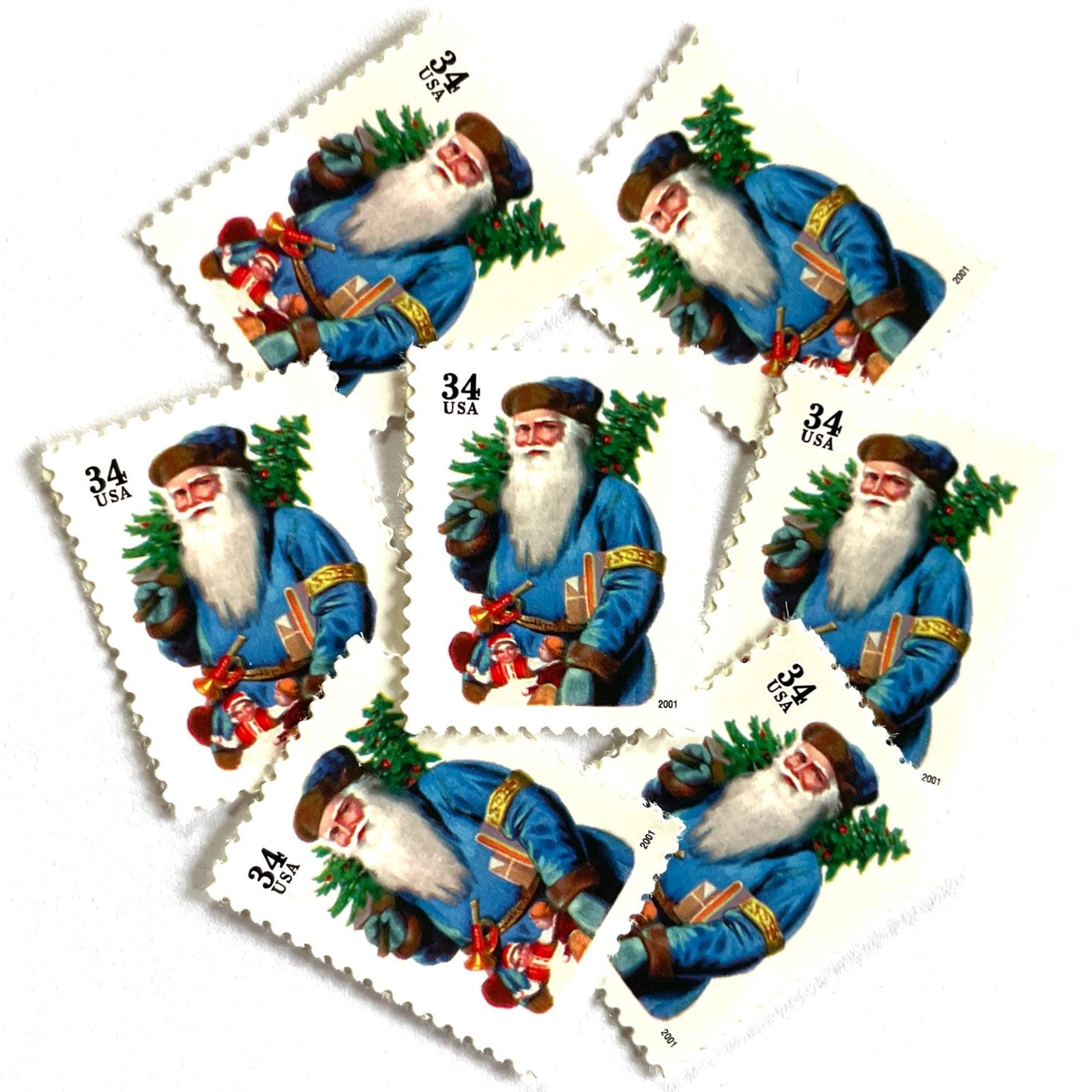 Image of 34-cent Contemporary Christmas 2001 Santa Claus Se-tenant "Santa with Horn" and blue coat USPS postage stamps featuring a relatively skinny white bearded Santa wearing a brown, hooded robe over a red suit. This jolly looking Santa is portly and jovial with a full white beard, a blue suit trimmed in gold, a blue cap, and a small horn attached to his belt. Scott #3538. Stamp themes: Christmas, holidays, winter, Santa Claus, toys, gifts, winter wedding, winter save-the-date. Blue postage stamp.
