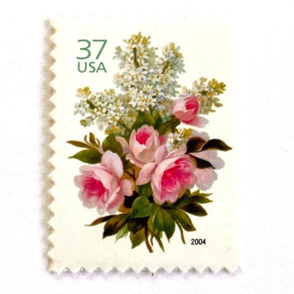 Image of 2004 Wedding Series “Garden Bouquet” unused 37-cent USPS mail stamps. Scott #3836. Stamp Themes: Flowers, Floral, Botanical, Bouquet, Wedding Bouquet, Bridal Flowers, Pastels, Victorian-era Botanical Art. Pink, White, Green, Multicolored postage stamp. Perfect postage stamp to use for save the date announcements, wedding invitation postage, shower invitations, thank you cards, valentine’s day, and snail mail.