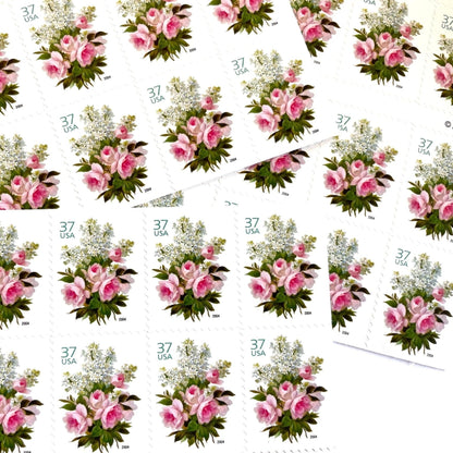 Image of 2004 Wedding Series “Garden Bouquet” unused 37-cent USPS mail stamps. Scott #3836. Stamp Themes: Flowers, Floral, Botanical, Bouquet, Wedding Bouquet, Bridal Flowers, Pastels, Victorian-era Botanical Art. Pink, White, Green, Multicolored postage stamp. Perfect postage stamp to use for save the date announcements, wedding invitation postage, shower invitations, thank you cards, valentine’s day, and snail mail.