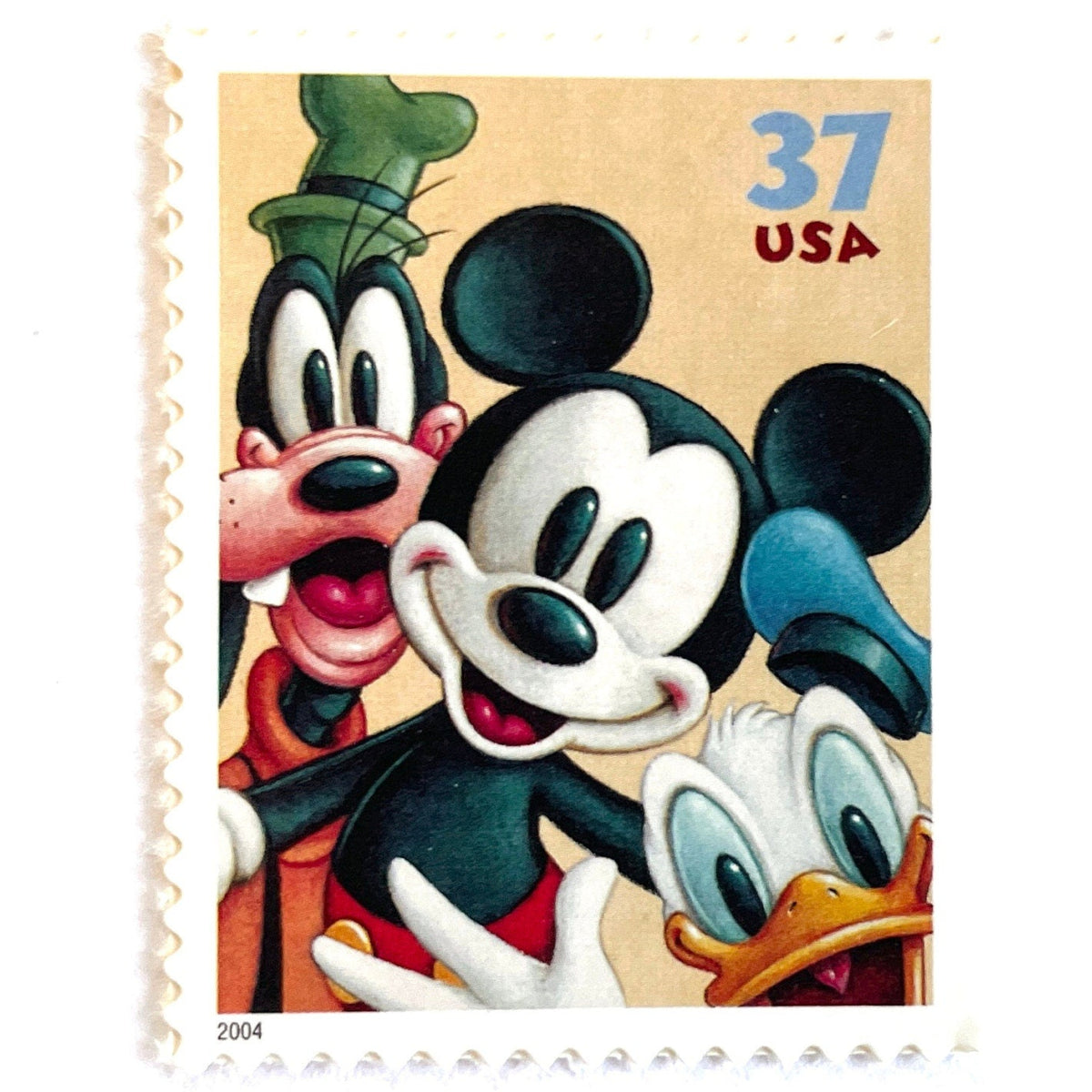 Mickey Mouse, Goofy and Donald Duck postage stamp from 2004 featuring the classic Disney friends on vintage unused 37-cent USPS postage, Scott 3865.