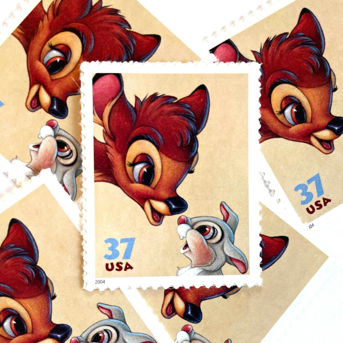 Bambi and Thumper postage stamps from 2004 featuring the beloved Disney woodland friends on vintage unused 37-cent USPS postage.