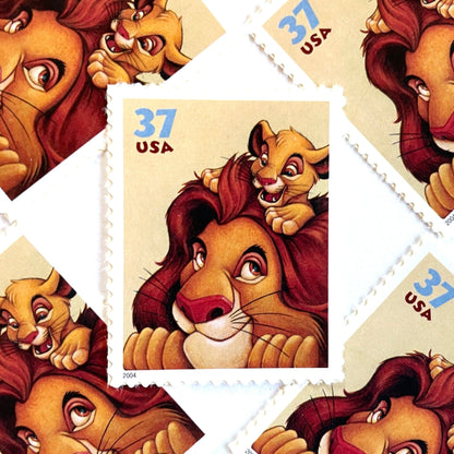 Mufasa and Simba postage stamps from 2004 featuring the father-and-son lions from The Lion King on vintage unused 37-cent USPS postage, Scott 3867.