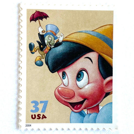 Pinocchio and Jiminy Cricket postage stamp from 2004 featuring the classic Disney friends on vintage unused 37-cent USPS postage.
