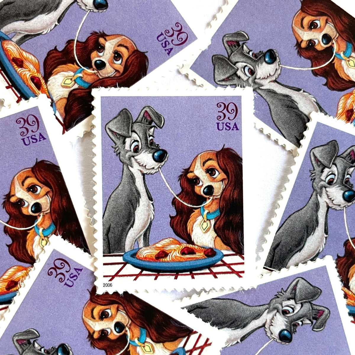 Lady and the Tramp postage stamps from 2006 featuring the romantic spaghetti dinner scene on vintage unused 39-cent USPS postage.