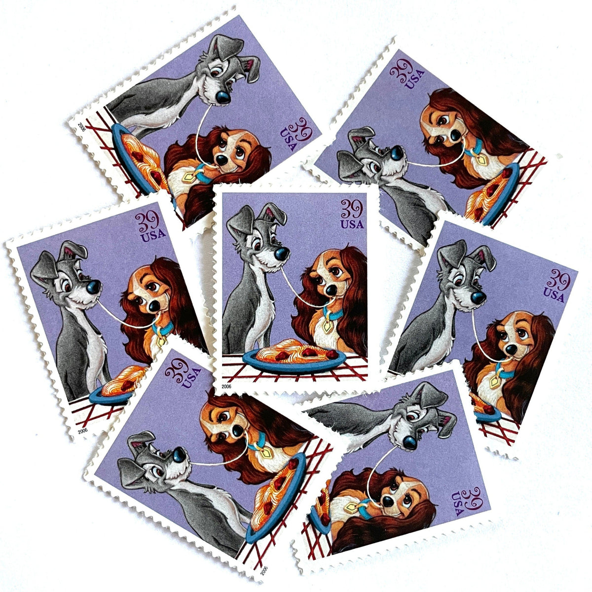 Lady and the Tramp postage stamps from 2006 featuring the romantic spaghetti dinner scene on vintage unused 39-cent USPS postage.