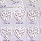 Image of 2007 Wedding Series “Purple Wedding Hearts” unused 41-cent USPS mail stamps. Scott #4151. Stamp Themes: Heart, Love, Wedding, Bridal. Purple, Lavender, Violet, White, Multicolored postage stamp. Perfect postage stamp to use for save the date announcements, wedding invitation postage, shower invitations, thank you cards, valentine’s day, and snail mail.