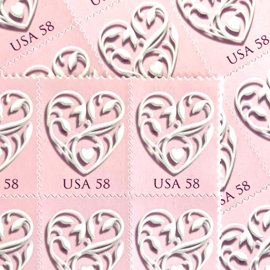 Image of 2007 Wedding Series “Pink Wedding Hearts” unused 58-cent USPS mail stamps. Scott #4152. Stamp Themes: Heart, Love, Wedding, Bridal. Pink, White, Multicolored postage stamp. Perfect postage stamp to use for save the date announcements, wedding invitation postage, shower invitations, thank you cards, valentine’s day, and snail mail.