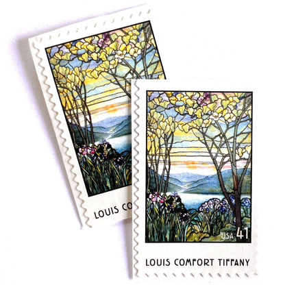 Image of 2007 American Treasures series “Louis Comfort Tiffany” (Magnolias and Irises in Stained Glass) unused 41-cent vintage USPS mail stamps. Scott #4165. Stamp Themes: Flowers, Floral, Botanical, Gardening, Nature, Tiffany Stained Glass. Purple, Blue, White, Multicolored self-adhesive postage stamp. Perfect postage stamp to use for save the date announcements, wedding invitation postage, bridal shower invitations, birth announcements, thank you cards, valentine’s day, and snail mail.