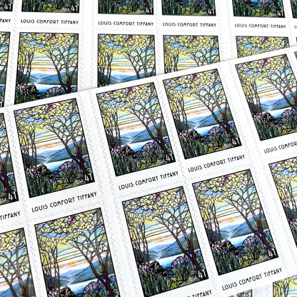 Image of 2007 American Treasures series “Louis Comfort Tiffany” (Magnolias and Irises in Stained Glass) unused 41-cent vintage USPS mail stamps. Scott #4165. Stamp Themes: Flowers, Floral, Botanical, Gardening, Nature, Tiffany Stained Glass. Purple, Blue, White, Multicolored self-adhesive postage stamp. Perfect postage stamp to use for save the date announcements, wedding invitation postage, bridal shower invitations, birth announcements, thank you cards, valentine’s day, and snail mail.