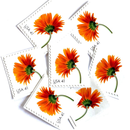 Image of 2007 Beautiful Blooms series “Orange Gerbera Daisy” unused 41-cent vintage USPS mail stamps. Scott #4177. Stamp Themes: Flowers, Floral, Botanical, Fragrant, Gardening, Nature. Orange, Green, Multicolored self-adhesive postage stamp. Perfect postage stamp to use for save the date announcements, wedding invitation postage, bridal shower invitations, birth announcements, thank you cards, valentine’s day, and snail mail.