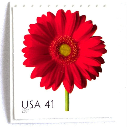 Image of 2007 Beautiful Blooms series “Red Gerbera Daisy” unused 41-cent vintage USPS mail stamps. Scott #4181. Stamp Themes: Flowers, Floral, Botanical, Fragrant, Gardening, Nature. Red, Green, Multicolored self-adhesive postage stamp. Perfect postage stamp to use for save the date announcements, wedding invitation postage, bridal shower invitations, birth announcements, thank you cards, valentine’s day, and snail mail.