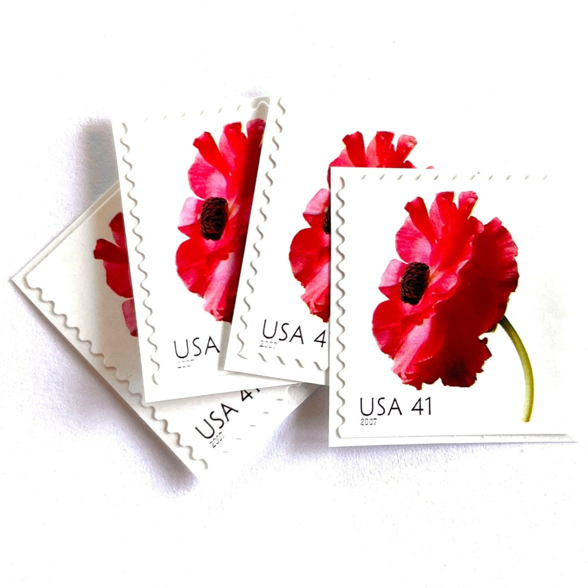 Image of 2007 Beautiful Blooms series “Poppy” unused 41-cent vintage USPS mail stamps. Scott #4183. Stamp Themes: Flowers, Floral, Botanical, Fragrant, Gardening, Nature. Red, Green, Multicolored self-adhesive postage stamp. Perfect postage stamp to use for save the date announcements, wedding invitation postage, bridal shower invitations, birth announcements, thank you cards, valentine’s day, and snail mail.