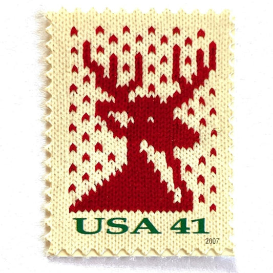 Image of 41-cent Contemporary Christmas Holiday Knits Reindeer USPS postage stamp featuring a red/orange knit reindeer on white background. Scott #4207. Themes: Christmas, Holidays, Winter, Reindeer, Deer, Stag, Stud, reindeer, deer, stag, orange, hunting, hunter, deer hunting, stag party, bachelor party, bachelor, stud, Red and White Stamp.