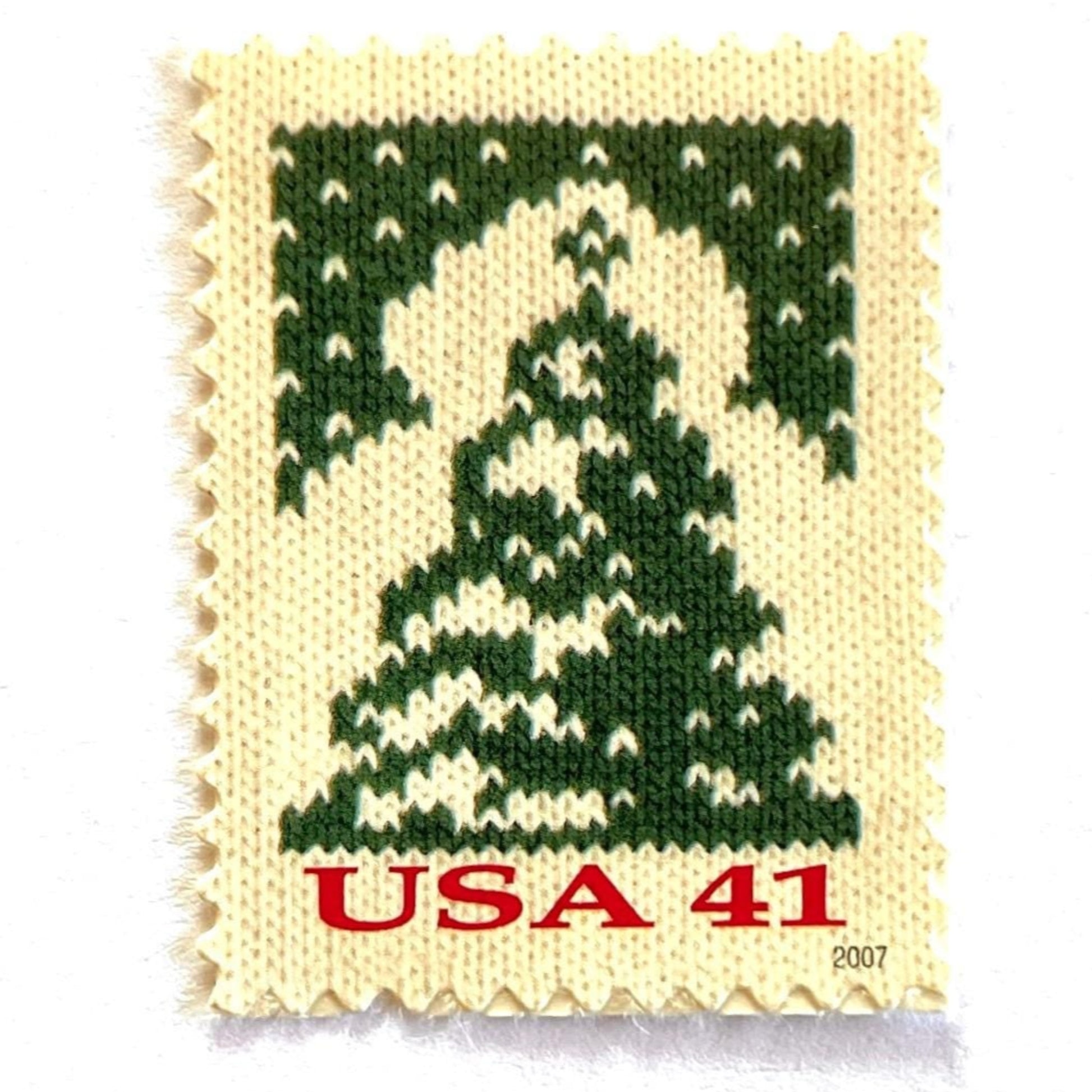 Image of 41-cent Contemporary Christmas Holiday Knits Christmas Tree USPS postage stamp featuring a green tree on white background. Scott #4208. Themes: Christmas, Holidays, Winter, Christmas Tree, Conifer, Evergreen, Green and White Stamp.