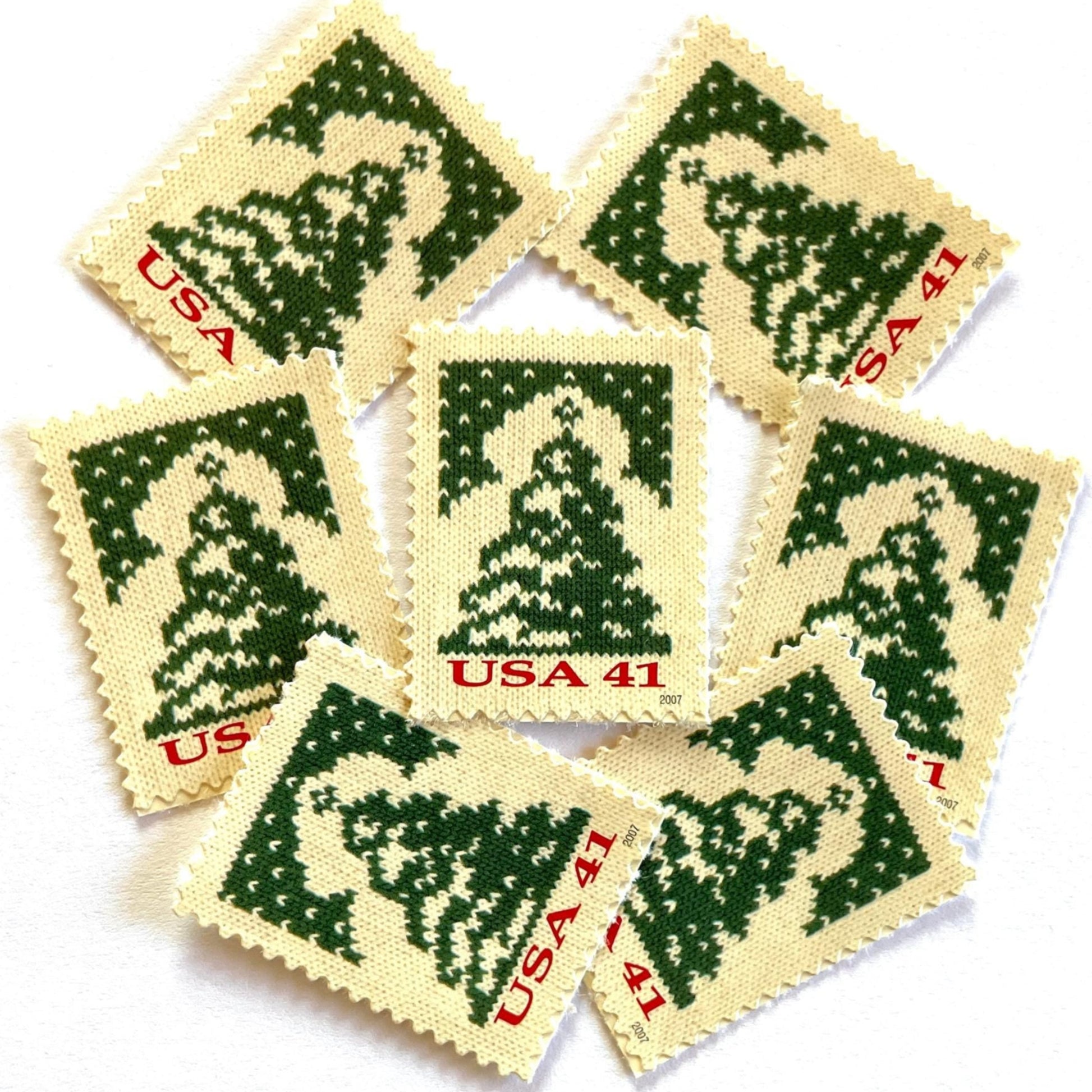 Image of 41-cent Contemporary Christmas Holiday Knits Christmas Tree USPS postage stamps featuring a green tree on white background. Scott #4208. Themes: Christmas, Holidays, Winter, Christmas Tree, Conifer, Evergreen, Green and White Stamp.