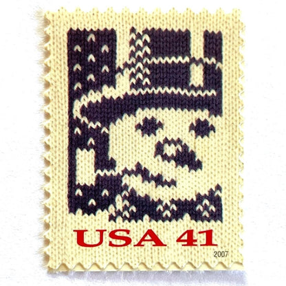 Image of 41-cent Contemporary Christmas Holiday Knits Snowman USPS postage stamp featuring a blue snowman on white background. Scott #4209. Themes: Christmas, Hanukkah, Holidays, Winter, Snow, Snowman, Frosty the Snowman, Blue Stamp.