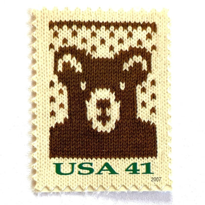 Image of 41-cent Contemporary Christmas Holiday Knits Bear USPS postage stamp featuring a brown knit teddy bear on white background. Scott #4210. Themes: Christmas, Holidays, Winter, Bear, Teddy Bear, Brown and White Stamp.