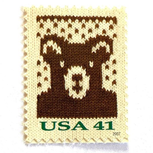 Image of 41-cent Contemporary Christmas Holiday Knits Bear USPS postage stamp featuring a brown knit teddy bear on white background. Scott #4210. Themes: Christmas, Holidays, Winter, Bear, Teddy Bear, Brown and White Stamp.