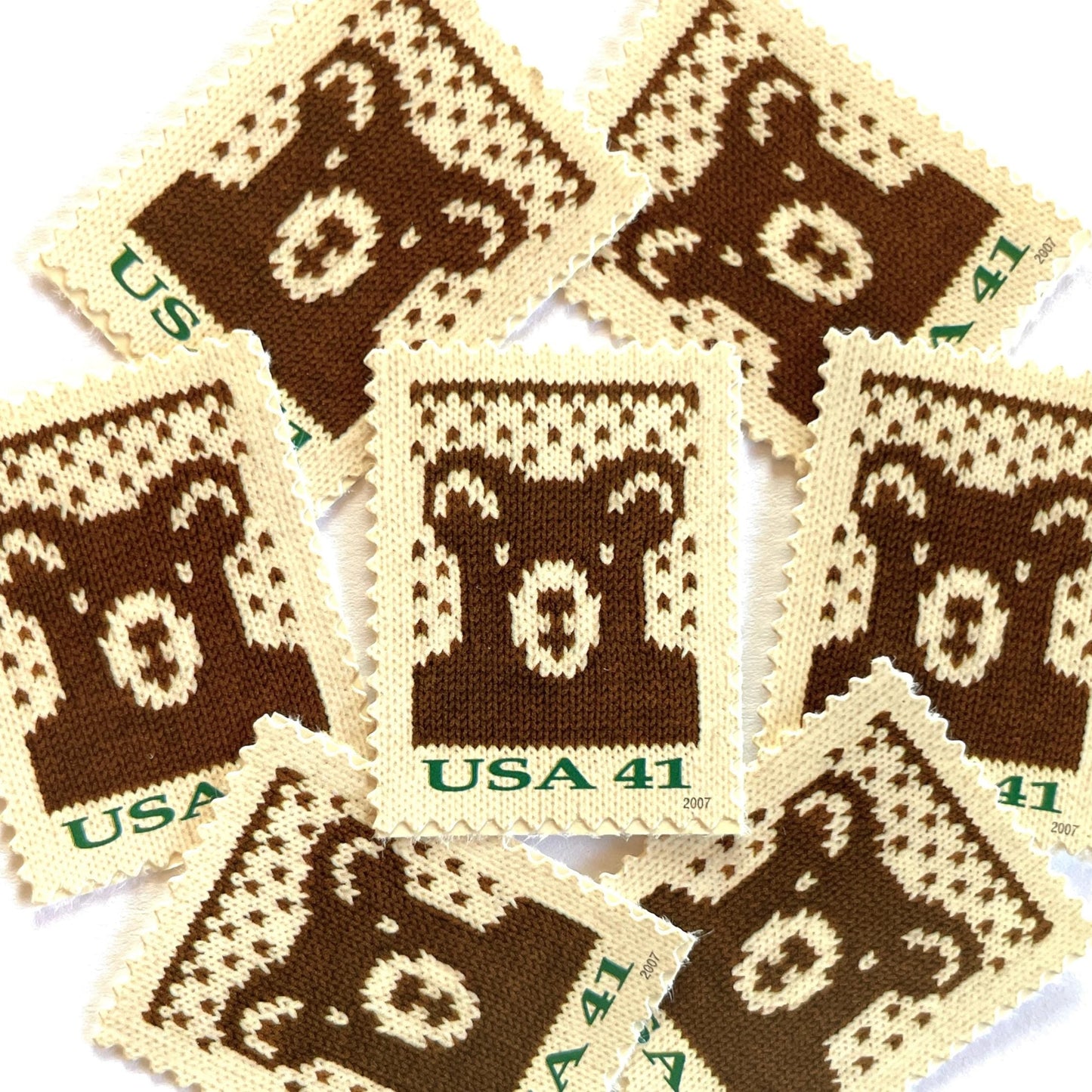 Image of 41-cent Contemporary Christmas Holiday Knits Bear USPS postage stamps featuring a brown knit teddy bear on white background. Scott #4210. Themes: Christmas, Holidays, Winter, Bear, Teddy Bear, Brown and White Stamp.