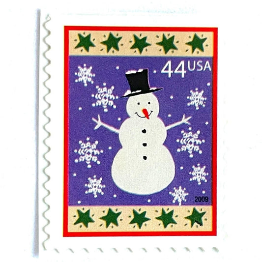 Image of 44-cent Contemporary Christmas Winter Holidays Snowman USPS postage stamp featuring a white snowman and snowflakes against a purple background with a design reminiscent of Christmas wrapping paper. Scott #4426. Stamp themes: Christmas, holidays, winter, snow, snowflakes, winter wedding, winter save-the-date. Purple postage stamp.