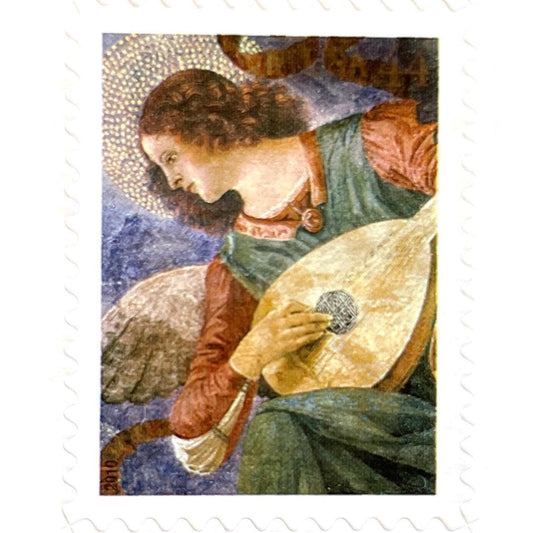 Vintage 2010 Angel with Lute Christmas postage stamp featuring a haloed musical angel from a Renaissance fresco by Melozzo da Forlì on unused 44-cent USPS postage, Scott 4477.