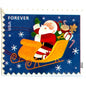 Santa Flying in Sleigh postage stamp from 2012 featuring St. Nick traveling through a wintry Christmas Eve sky in his sleigh on unused USPS Forever postage, Scott 4713.