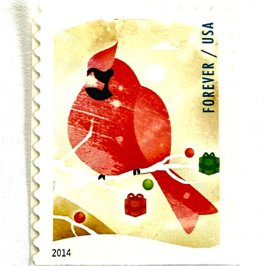 Cardinal postage stamps from 2014 featuring a bright northern cardinal in a snowy winter bird-watching scene on unused USPS Forever postage, Scott 4939.