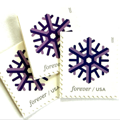 Purple and lilac Geometric Snowflake postage stamps from 2015 featuring a stylized crystalline winter design on unused USPS Forever postage, Scott 5031.
