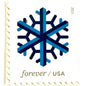 Dark blue and blue Geometric Snowflake postage stamp from 2015 featuring a stylized crystalline winter design on unused USPS Forever postage, Scott 5032.