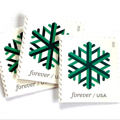 Green Geometric Snowflake postage stamps from 2015 featuring a stylized crystalline winter design on unused USPS Forever postage, Scott 5033.