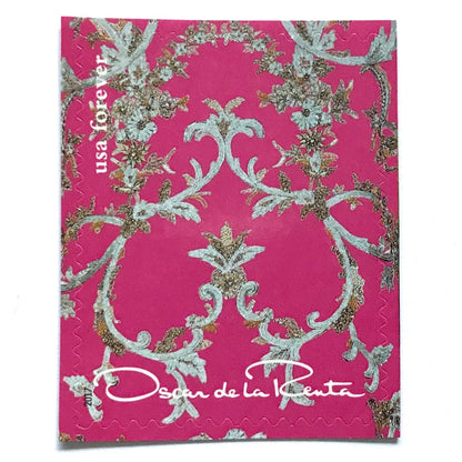 Oscar de la Renta Pink Fabric postage stamp from 2017 featuring bright pink fabric with metallic floral design on unused USPS Forever postage, Scott 5173b.