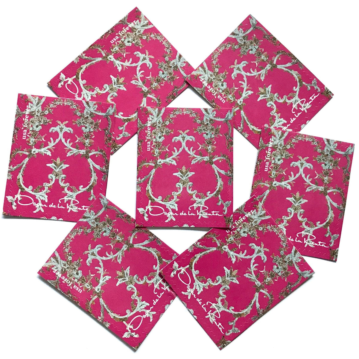 Oscar de la Renta Pink Fabric postage stamps from 2017 featuring bright pink fabric with metallic floral design on unused USPS Forever postage, Scott 5173b.