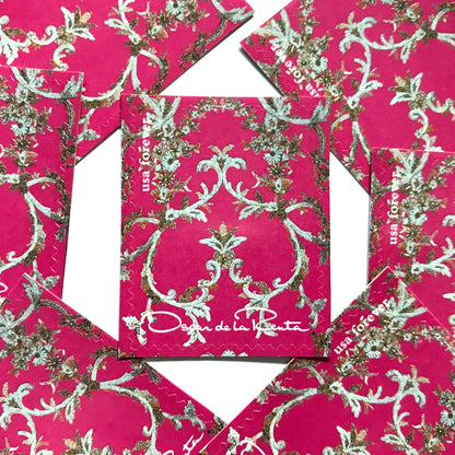 Oscar de la Renta Pink Fabric postage stamps from 2017 featuring bright pink fabric with metallic floral design on unused USPS Forever postage, Scott 5173b.