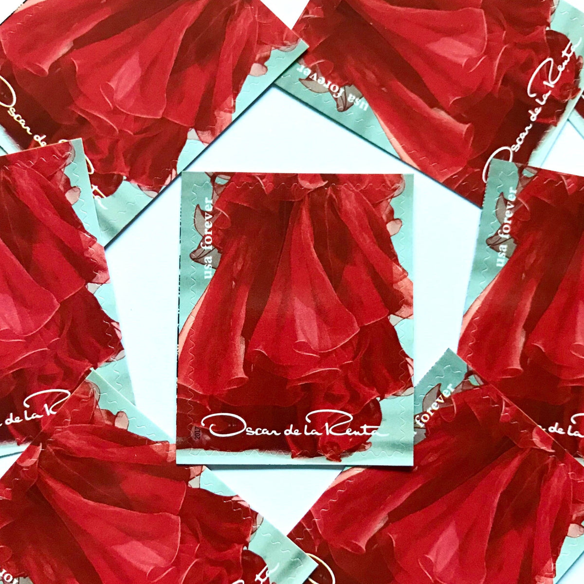 Oscar de la Renta Red Dress postage stamps from 2017 featuring a red couture dress on unused USPS Forever postage, Scott 5173e.