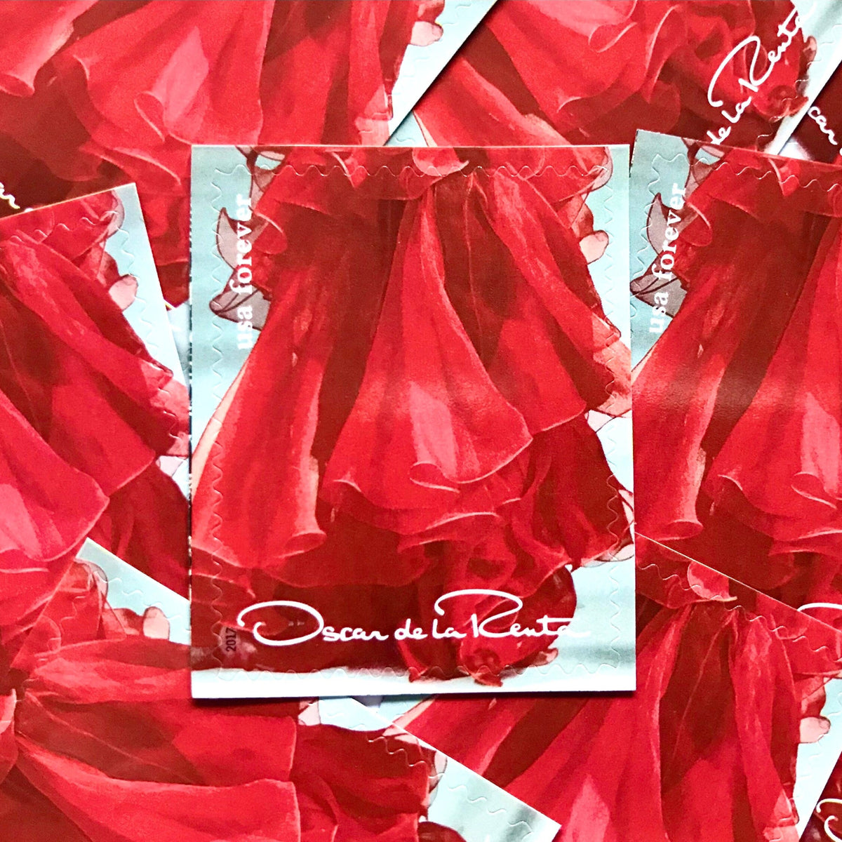 Oscar de la Renta Red Dress postage stamps from 2017 featuring a red couture dress on unused USPS Forever postage, Scott 5173e.