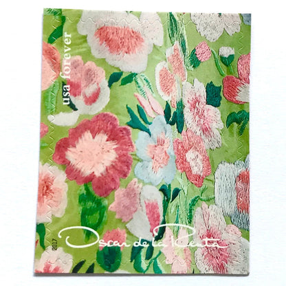 Oscar de la Renta Green Fabric postage stamps from 2017 featuring green fabric with pink floral pattern on unused USPS Forever postage, Scott 5173f.