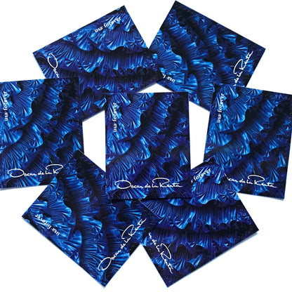 Oscar de la Renta Blue Dress Ruffles postage stamps from 2017 featuring a blue couture dress with ruffled detail on unused USPS Forever postage, Scott 5173g.