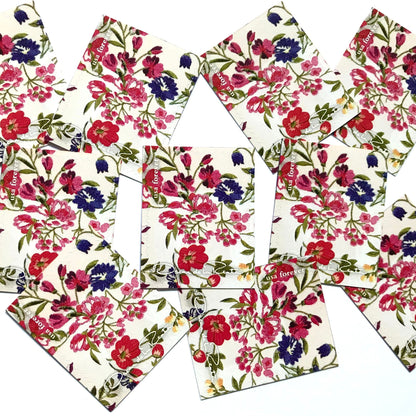 Oscar de la Renta White Floral Fabric postage stamps from 2017 featuring a floral fabric pattern with white background on unused USPS Forever postage, Scott 5173h.
