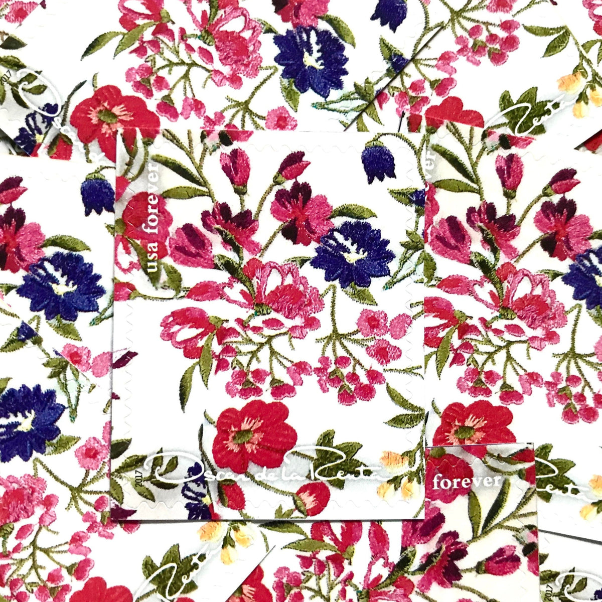 Oscar de la Renta White Floral Fabric postage stamps from 2017 featuring a floral fabric pattern with white background on unused USPS Forever postage, Scott 5173h.