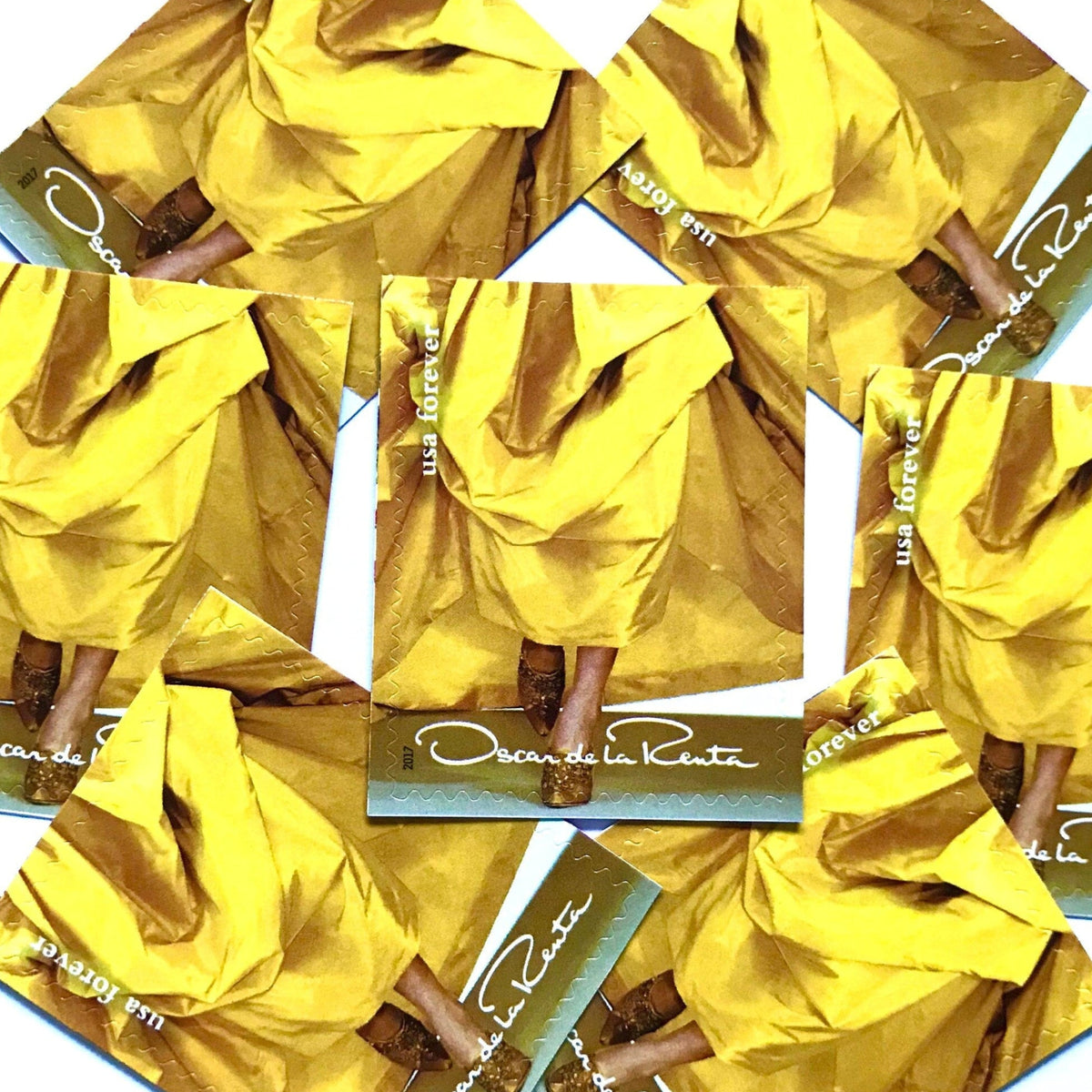 Oscar de la Renta Yellow Dress postage stamps from 2017 featuring a yellow couture dress on unused USPS Forever postage, Scott 5173i.