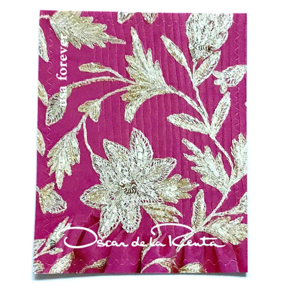 Oscar de la Renta Pink Floral Fabric postage stamp from 2017 featuring a pink, white and gray floral pattern on unused USPS Forever postage, Scott 5173j.